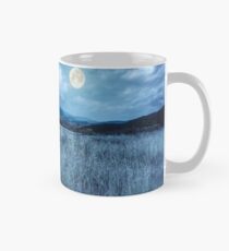 meadow with high grass in mountains at night Mug