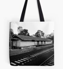 A dis-used train platform Tote Bag