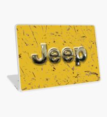 muddy yellow Jeep with chrome typograph Laptop Skin