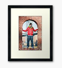 Boy with Manhatten Bridge in Background Framed Print
