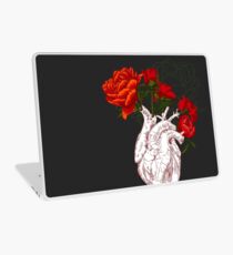 Vinilo para portátil dibujo corazón humano con flores