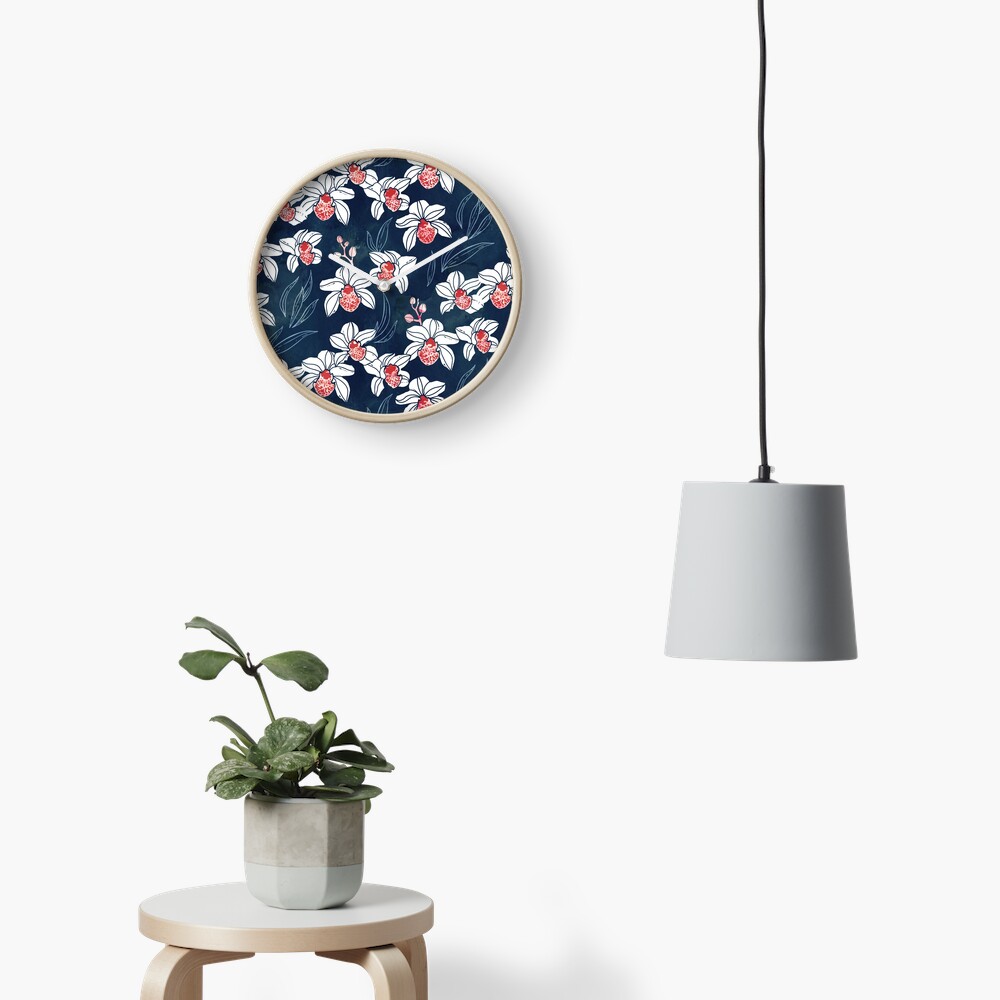 Orchid garden in white and peach on navy blue Clock