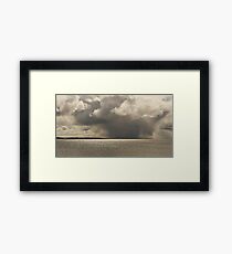 Snow Cloud Over Water Framed Print