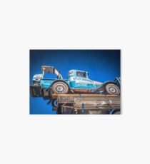 Truck On The Back Of A Bigger Truck Art Board