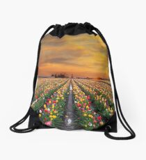 Sunset over colorful Tulip flower fields in full bloom spring season in Woodburn Oregon Drawstring Bag