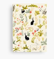 black rabbits Canvas Print