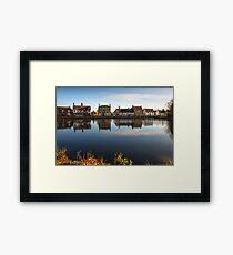 Scenic views over the still waters of the Causeway at Godmanchester Framed Print