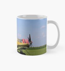 crop duster airplane on airfield Mug