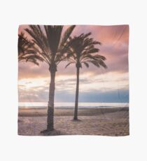 The Sun Rising Between Three Palm Trees on The Beach Scarf