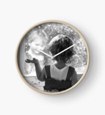 reflected child image Clock