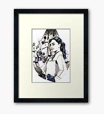 Qira Framed Print