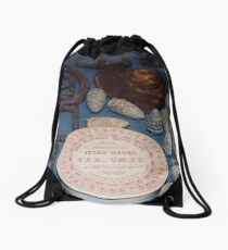 Belt buckles, iron musket bullets and Jules Hauel perfume from the 1840s Drawstring Bag