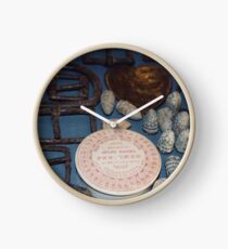 Belt buckles, iron musket bullets and Jules Hauel perfume from the 1840s Clock