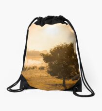 A Peaceful Glow Drawstring Bag