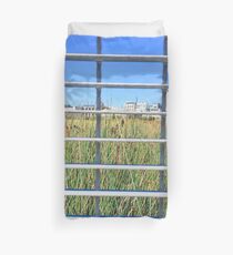 Grass Through The Grate Duvet Cover