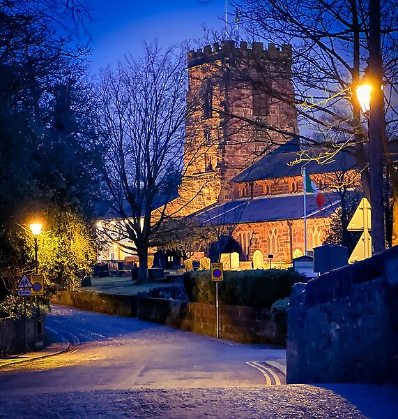 Winter evening looking down Church Lane, Grappenhall, South Warrington, Cheshire, UK