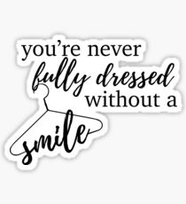 you're never fully dressed without a smile - annie Sticker