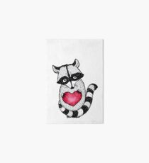 Raccoon carrying a heart. Art Board