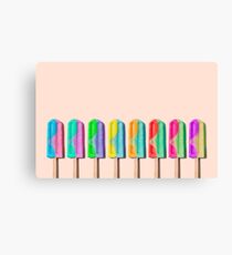 Row of rainbow-colored icecream lollies Canvas Print