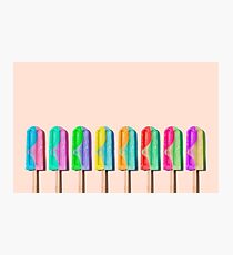 Row of rainbow-colored icecream lollies Photographic Print