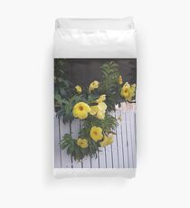 yellow flowers on the gatedoor Duvet Cover