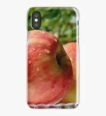 Ripe red apples in dew in a glass bowl iPhone Case