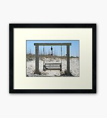 Swing by the sea Framed Print