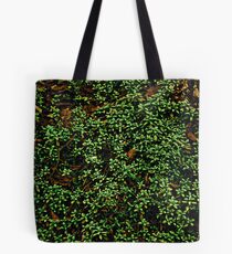 Texture vines with brick wall red bricks climbing green jungle vines and wild plants vintage eroded grunge style urban pattern Tote Bag