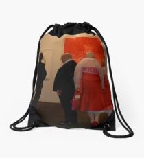 Red against black Drawstring Bag