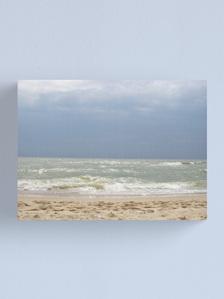 Alternate view of The sky and the sea communicating through the ray of light Canvas Print
