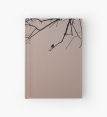 Silhouette of bird and twigs Hardcover Journal