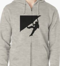 Climbing on an overhanging rock Zipped Hoodie