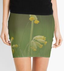 Cowslip blooming in a trio of Three Mini Skirt