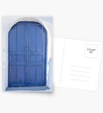Blue door in Santorini Postcards