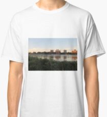 #city #skyline #water #cityscape #urban #river #downtown #sky #panorama #building #architecture #buildings #park #skyscraper #blue #view #reflection #sunset #lake #travel #town #sunrise #landscape Classic T-Shirt