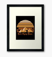 God's Playing Games Framed Print