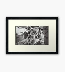 a weird little toy Framed Print