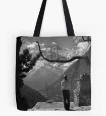 Girl looking out over valley and mountain Tote Bag