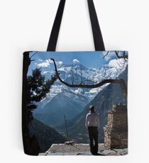 A girl looking out on to valley and mountains Tote Bag