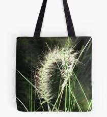 Sunlit grass flower Tote Bag