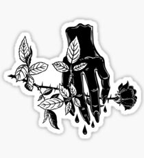 Female evil bleeding human hand holding a rose. Sticker