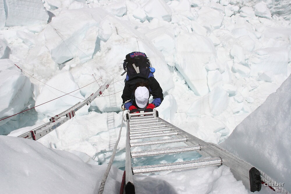"Mt. Everest Climbing crossing ladder through Khumbu icefall. " by