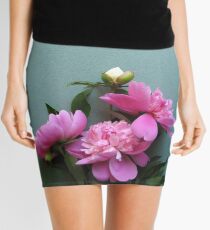 pink peony blooms on green background Mini Skirt