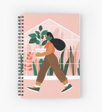 Beautiful girl with plant in pot Spiral Notebook