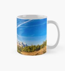 Sunny autumn day at the mount Tersadia in the italian alps Mug