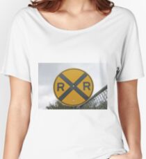 Railroad Crossing Road Sign #Railroad #Crossing #Road #Sign #RailroadCrossing #RoadSign #RailroadCrossingRoadSign #traffic #safety #danger #caveat #symbol #forbidden #travel #guidance #sky #street Women's Relaxed Fit T-Shirt