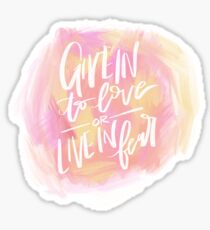 give in to love or live in fear Sticker