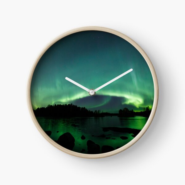 Beautiful northern lights over lake Clock