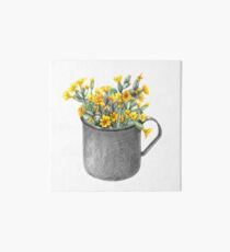 Mug with primulas Art Board Print
