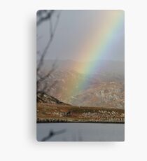 Rainbow over the loche on Skye Canvas Print